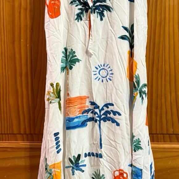Dresses & Skirts - Party Heart Flowy Beach Themed Cut out dress Size Small